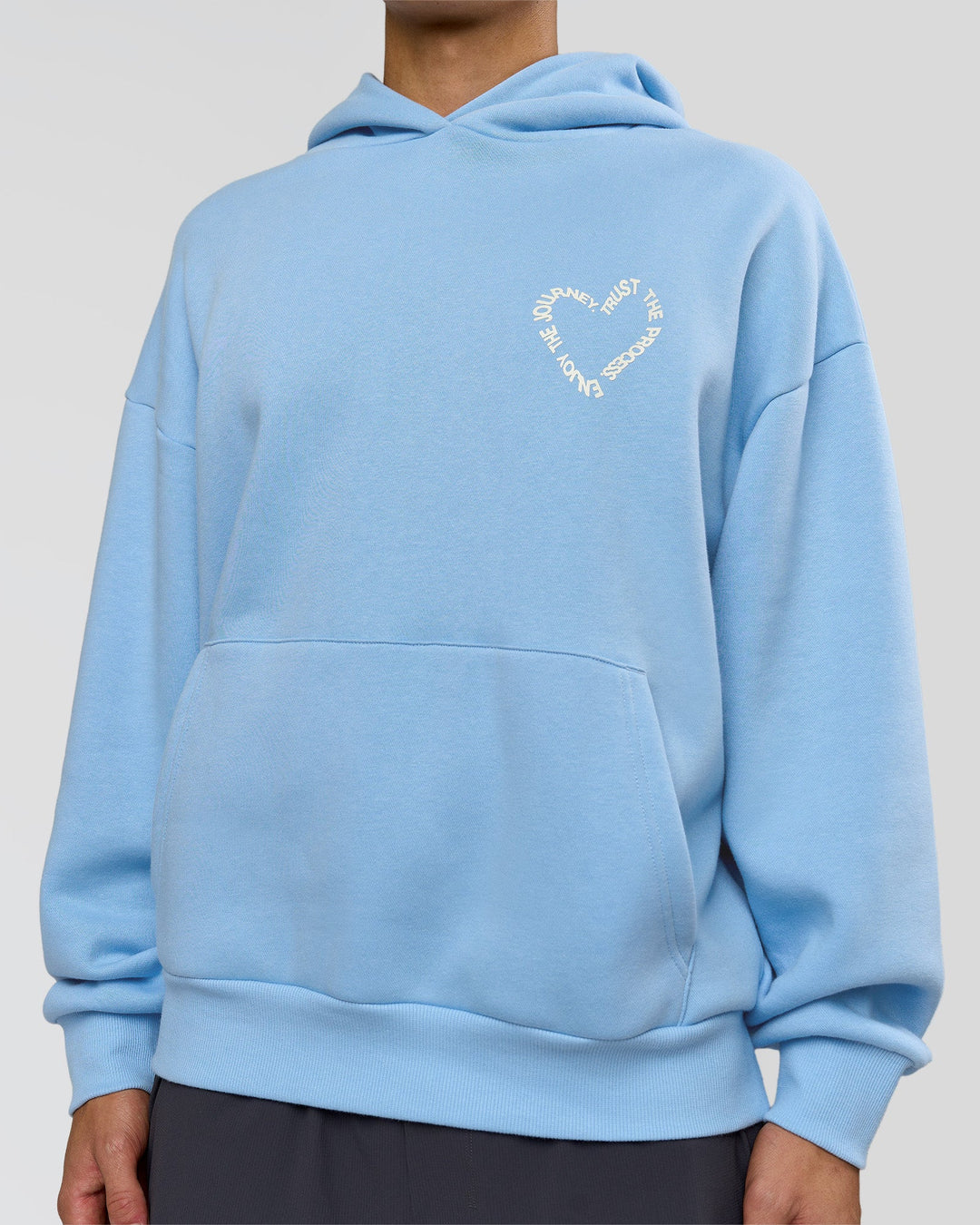 Man wearing Unisex Love The Process Oversize Hoodie - Open Air-Off White | Model:Leandro | Size:M