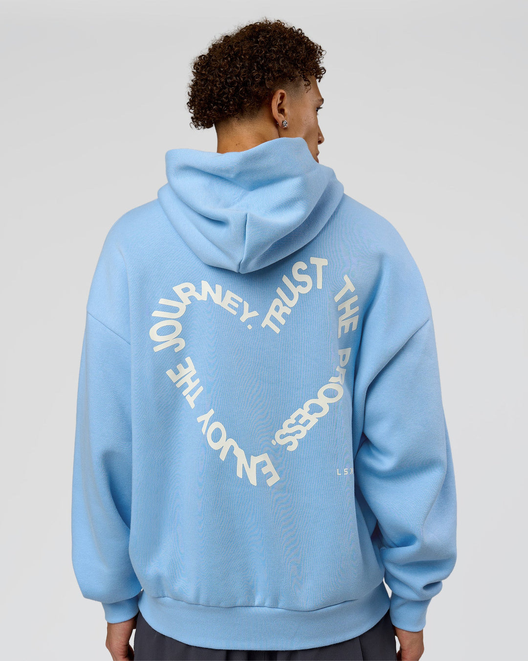 Man wearing Unisex Love The Process Oversize Hoodie - Open Air-Off White | Model:Leandro | Size:M