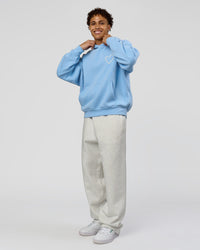 Man wearing Unisex Love The Process Oversize Hoodie - Open Air-Off White | Model:Leandro | Size:M