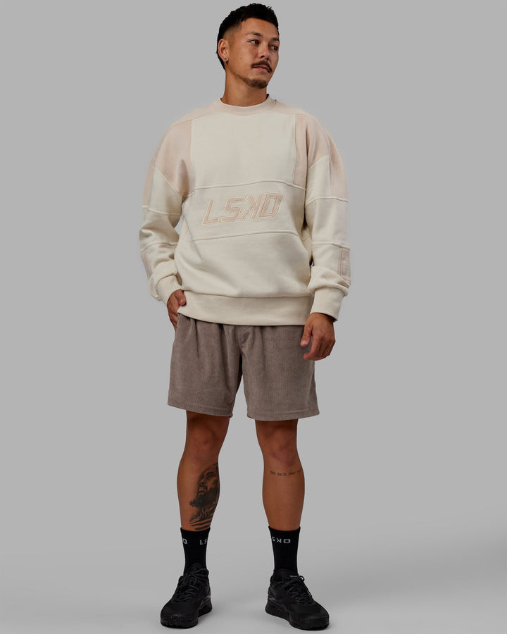 Man wearing Unisex Slam Sweater Oversize - Bone-Pumice Stone
