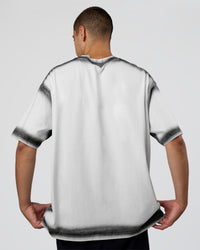 Man wearing Urban Blur Heavyweight Unisex Oversized Tee - White-Black | Model:Zoran | Size:M