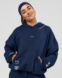 Woman wearing Zola Oversized Hoodie - Future Navy | Model:Grace | Size:M