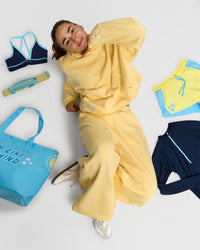 Woman wearing Zola Oversized Hoodie - Lemon | Model:Grace | Size:M