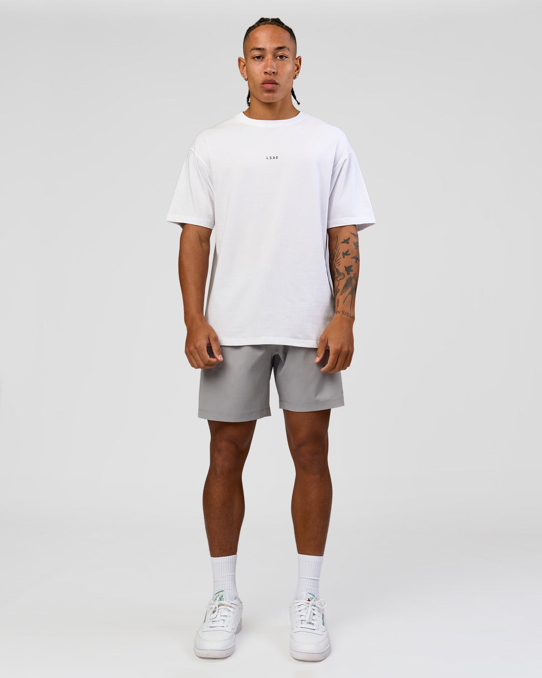 Man wearing Woman wearing Run Like The Wind FLXCotton Oversized Tee - White-Future Navy | Model:Malebo | Size:M