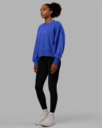 Woman wearing MVP Oversized Sweater - Power Cobalt