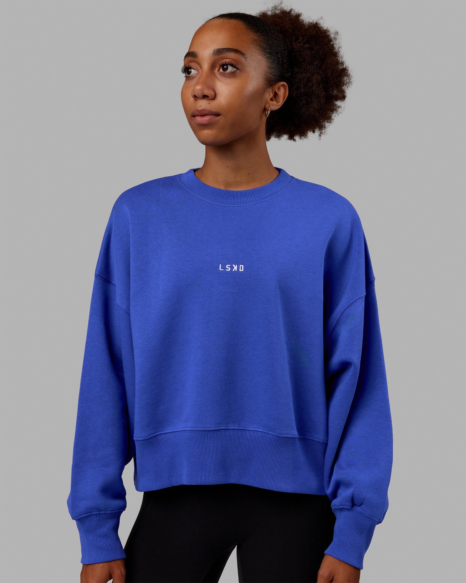 Woman wearing MVP Oversized Sweater - Power Cobalt