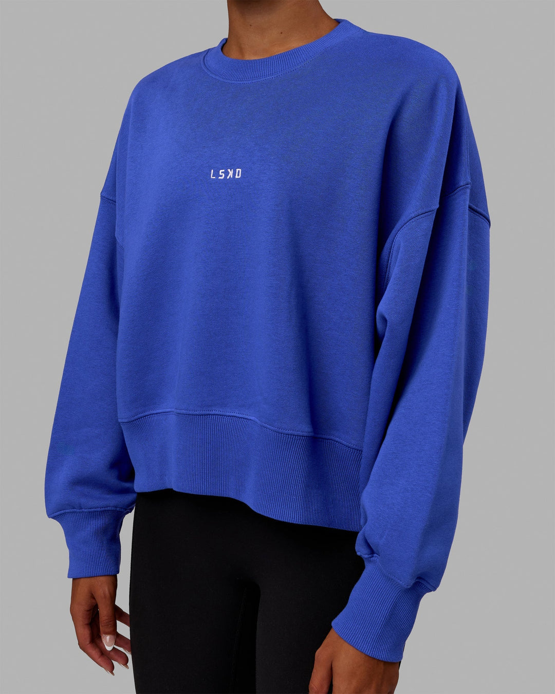Woman wearing MVP Oversized Sweater - Power Cobalt
