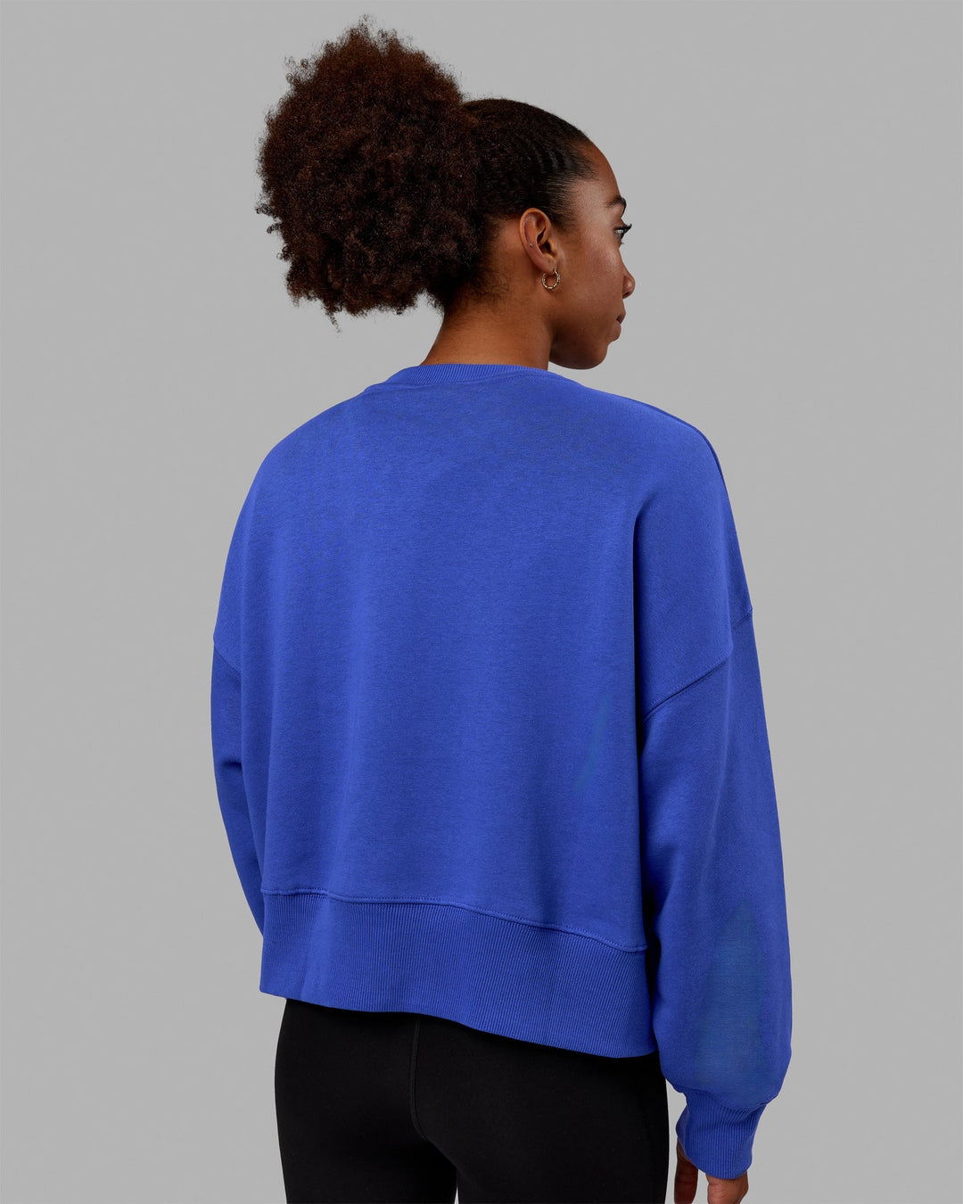 Woman wearing MVP Oversized Sweater - Power Cobalt