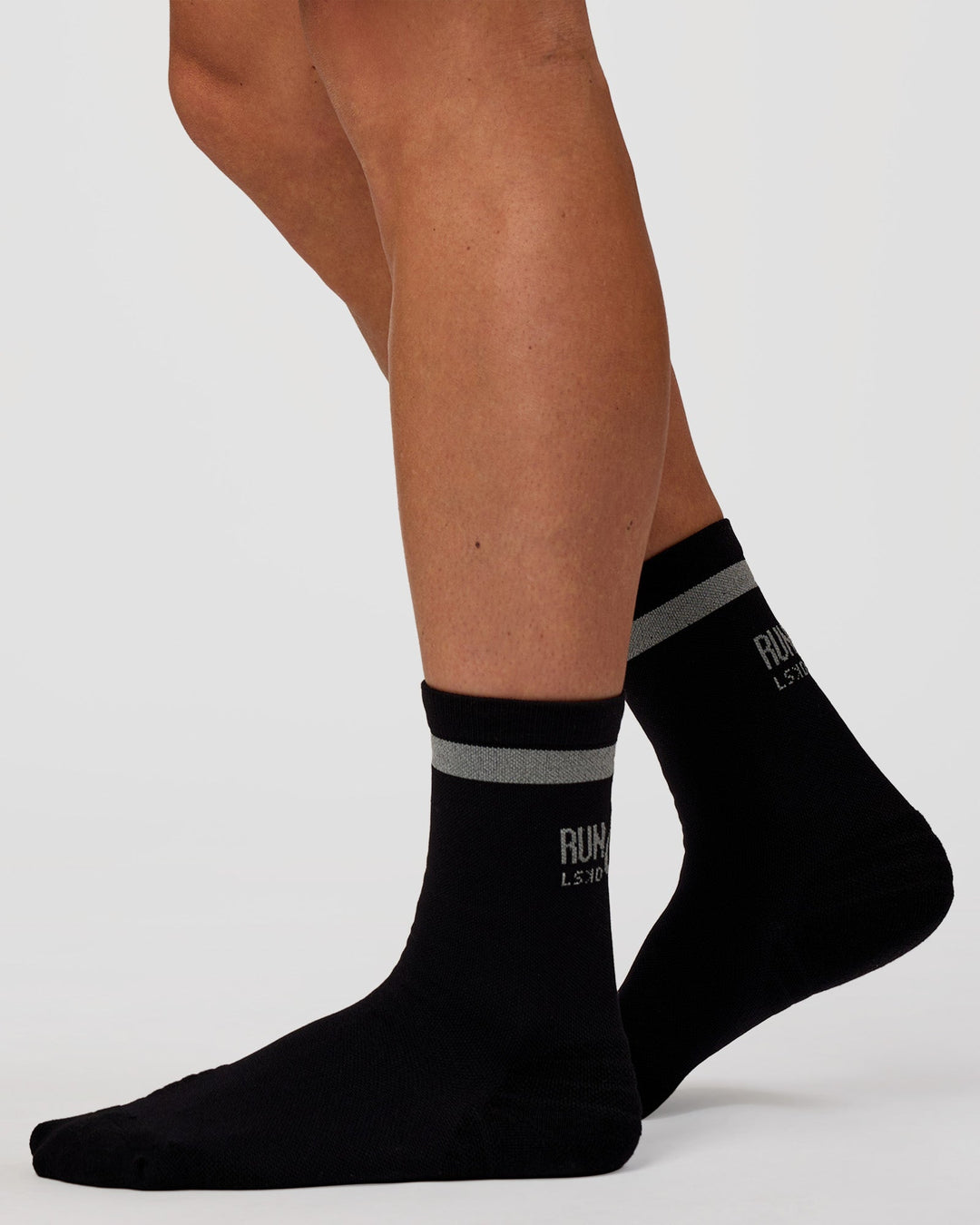 Man wearing Run Club Fast Performance Socks 2.0 - Black-Reflective - view 2