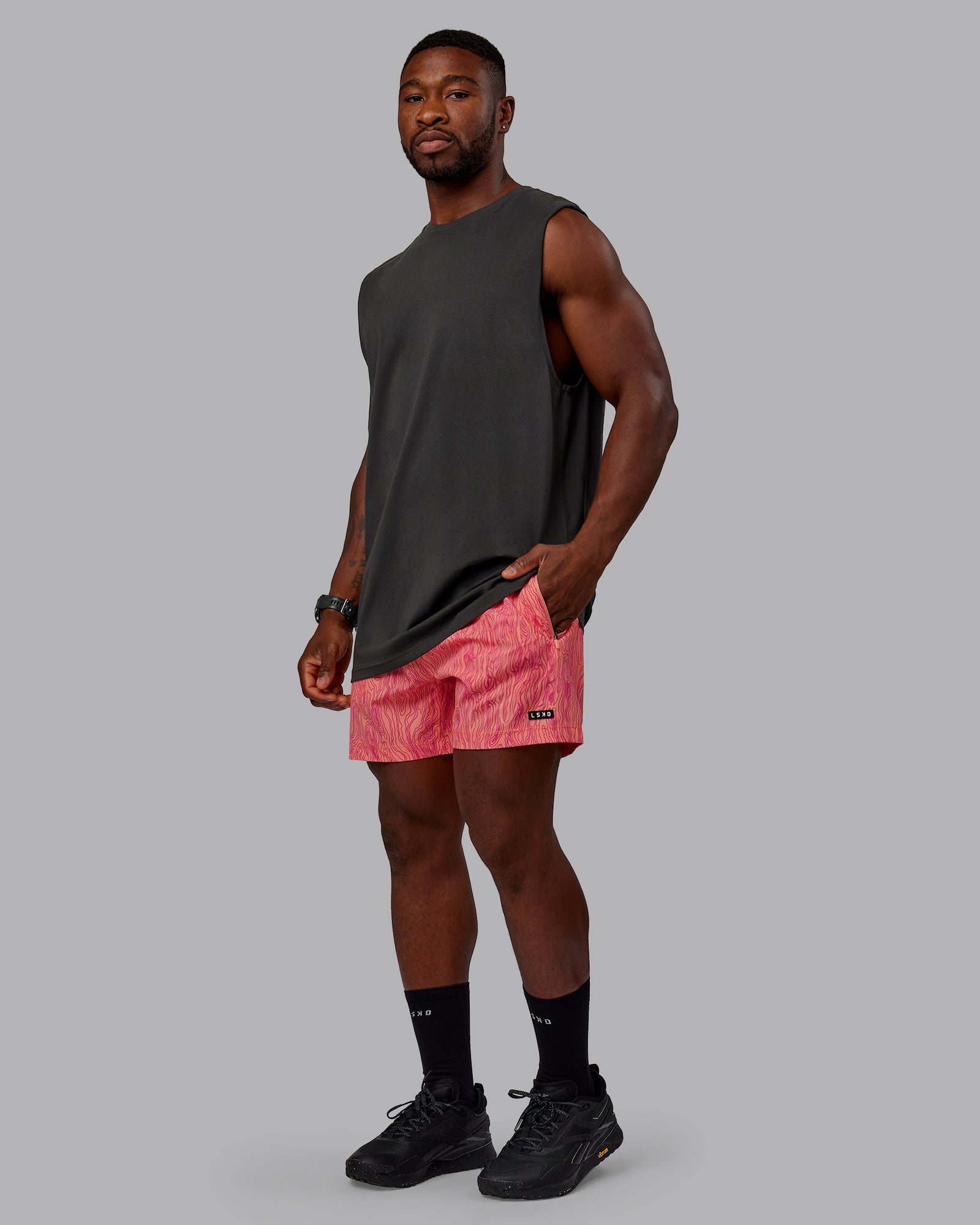Man wearing 1% Better Value Series FLXCotton Tank - Pirate Black-Black
