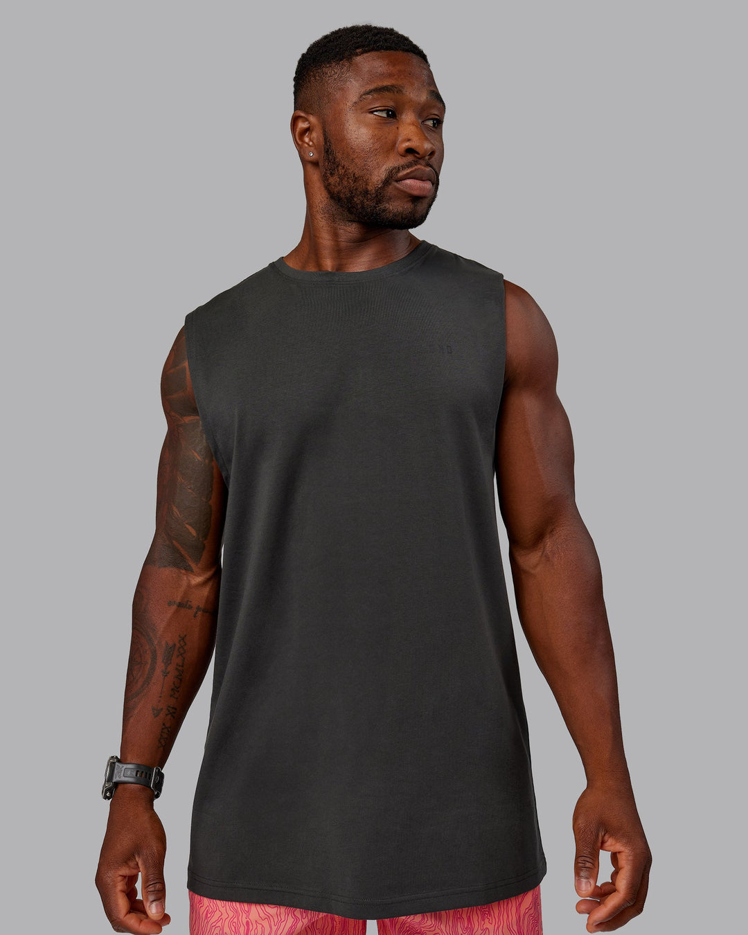 Man wearing 1% Better Value Series FLXCotton Tank - Pirate Black-Black