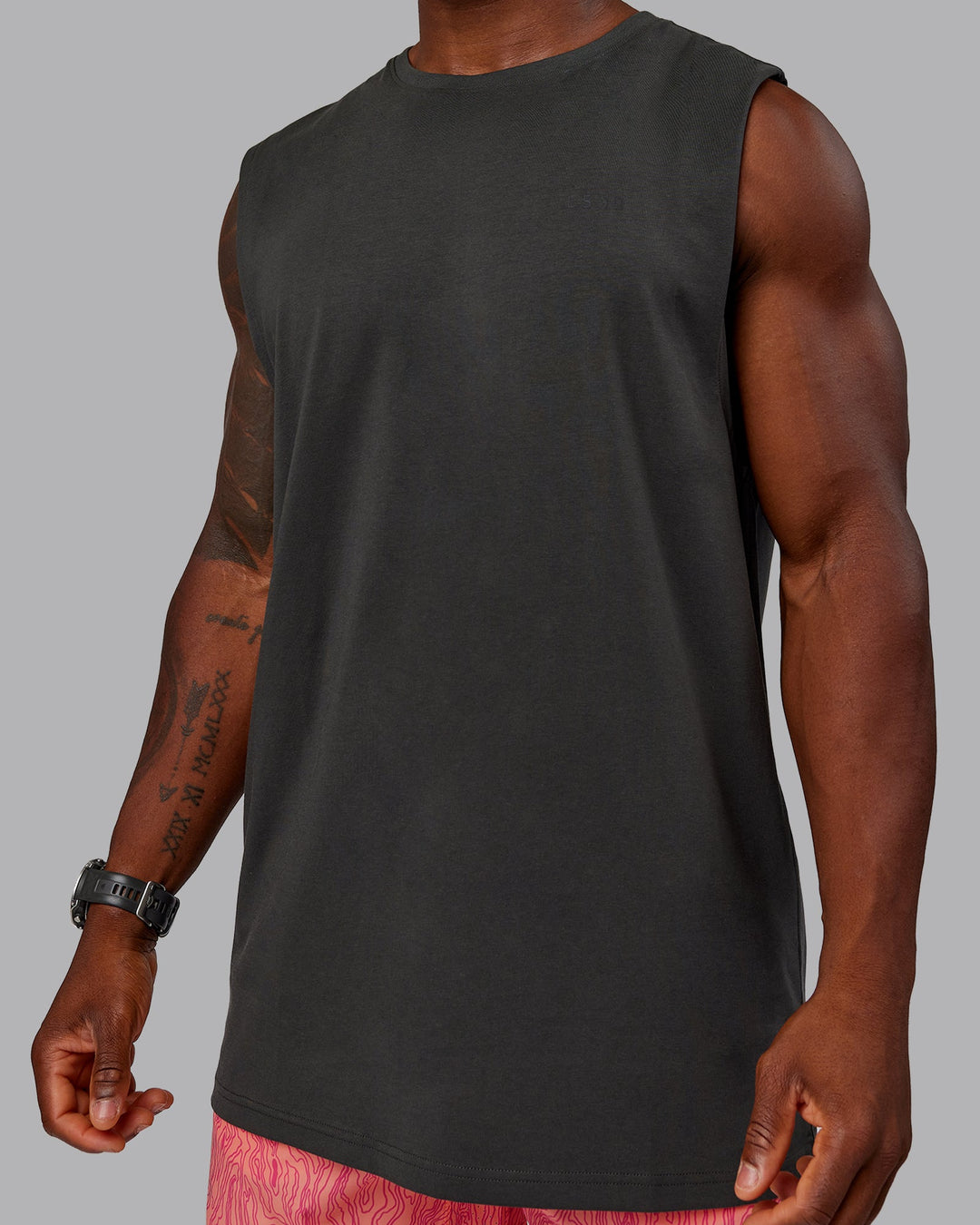 Man wearing 1% Better Value Series FLXCotton Tank - Pirate Black-Black