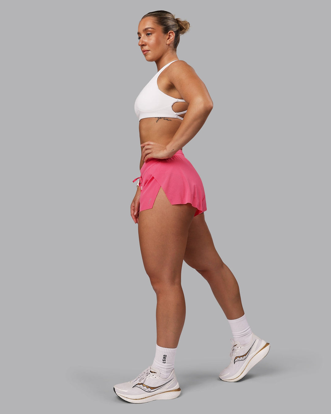 Woman wearing Accelerate 3&quot; Run Shorts - Pink Lemonade