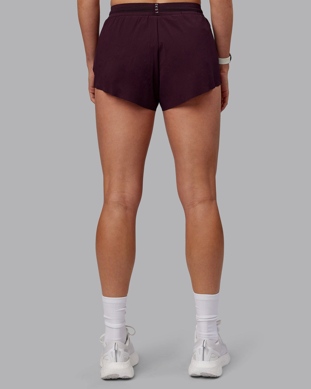 Woman wearing Accelerate 3&quot; Run Shorts - Mulberry