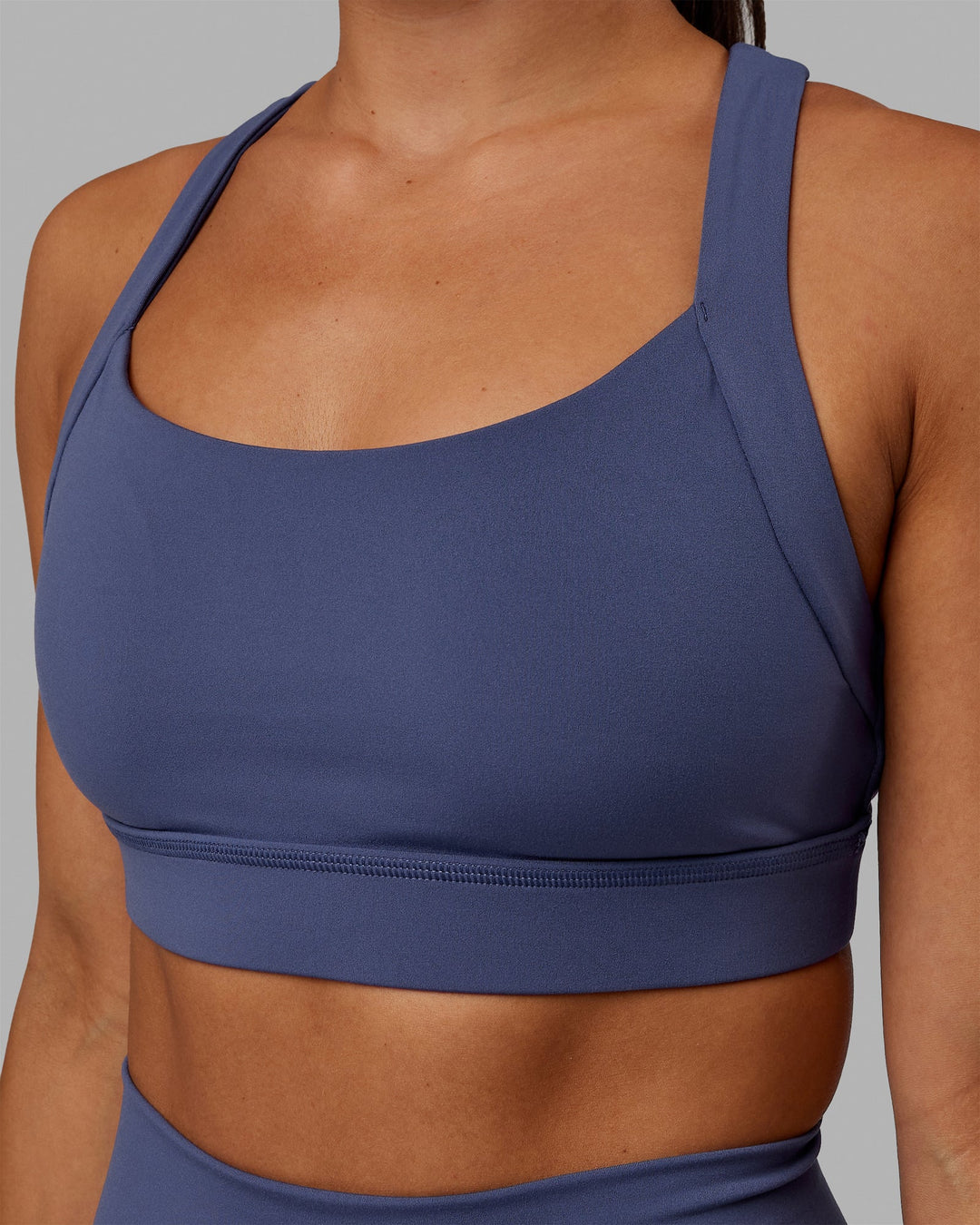 Woman wearing Advance Sports Bra - Future Dusk