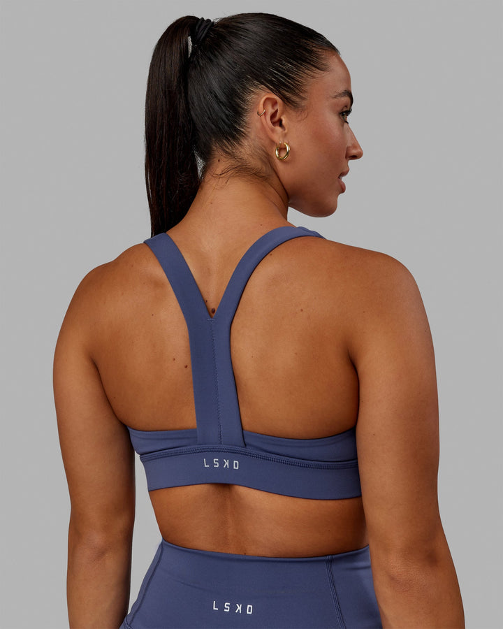 Woman wearing Advance Sports Bra - Future Dusk