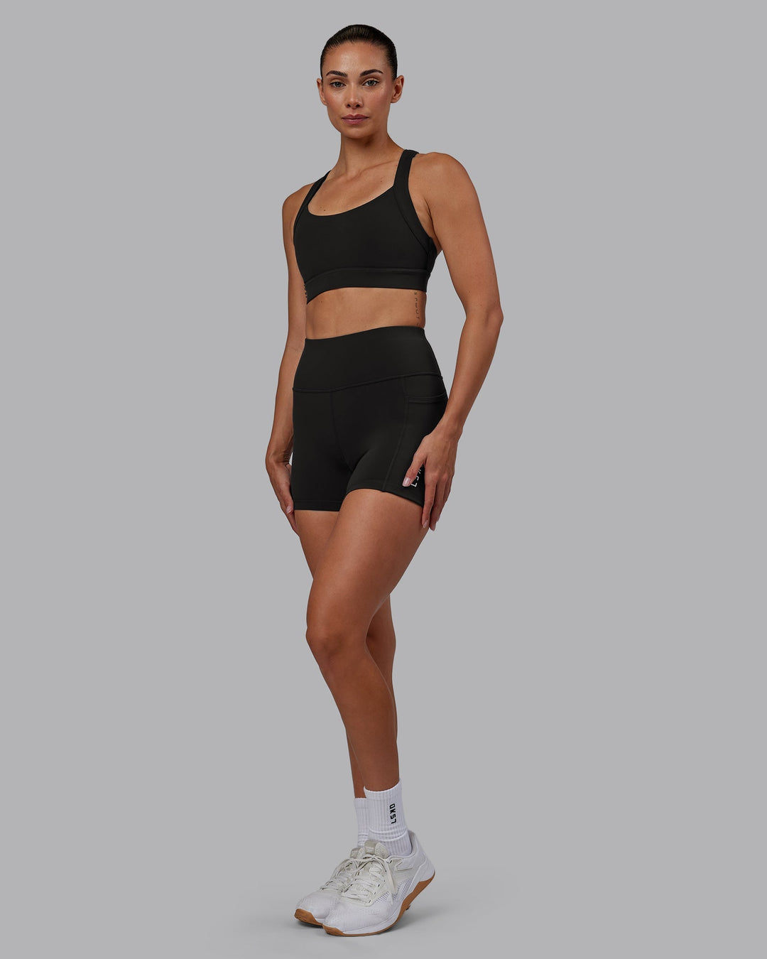 Woman wearing Advance Sports Bra - Pirate Black