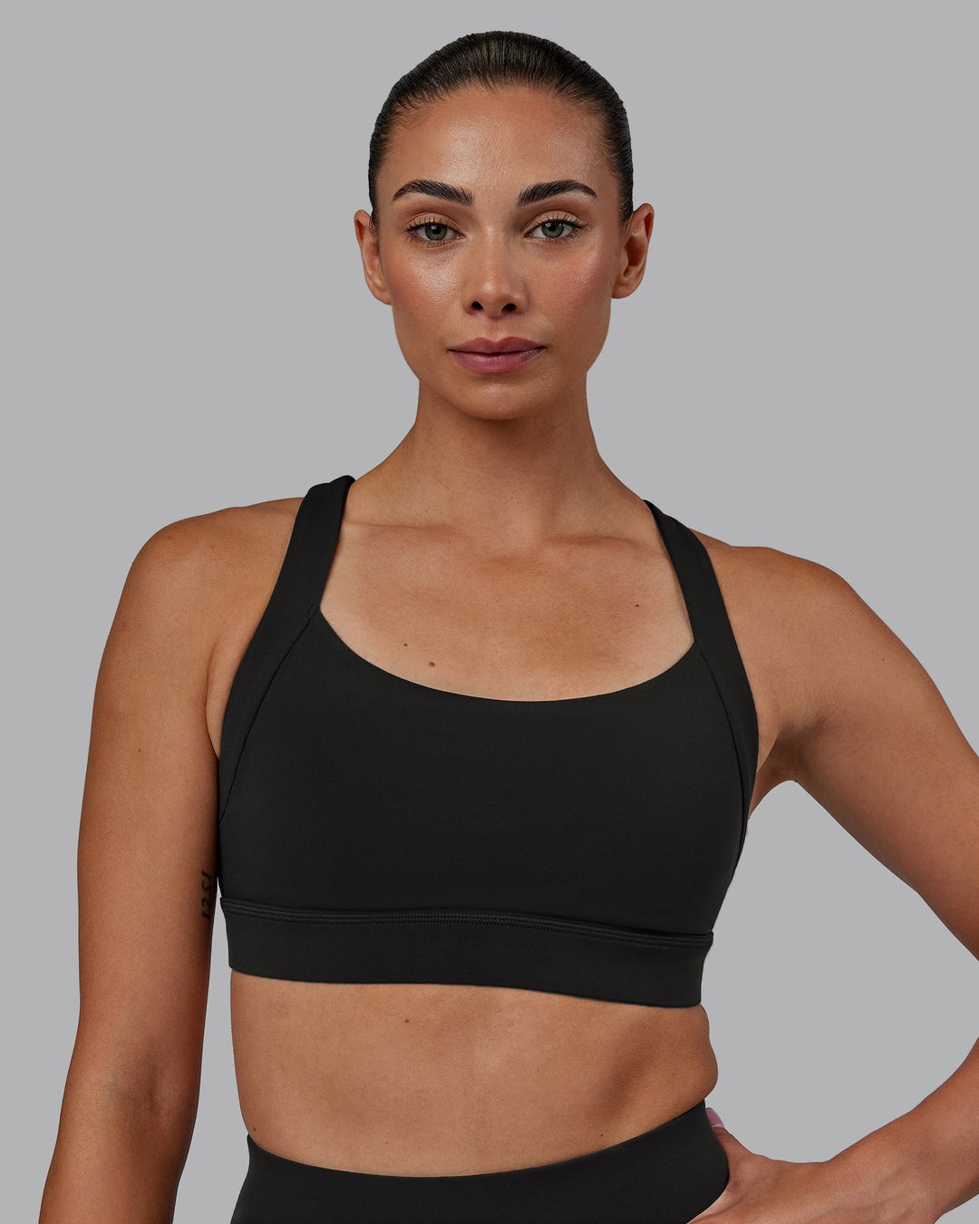 Woman wearing Advance Sports Bra - Pirate Black