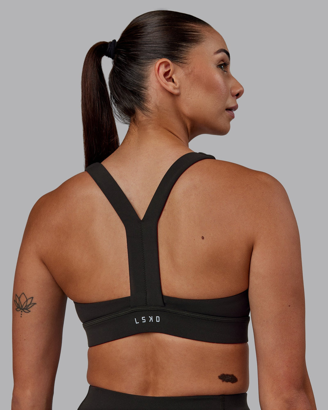 Woman wearing Advance Sports Bra - Pirate Black