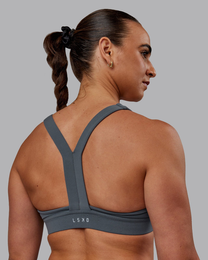 Woman wearing Advance Sports Bra - Turbulence
