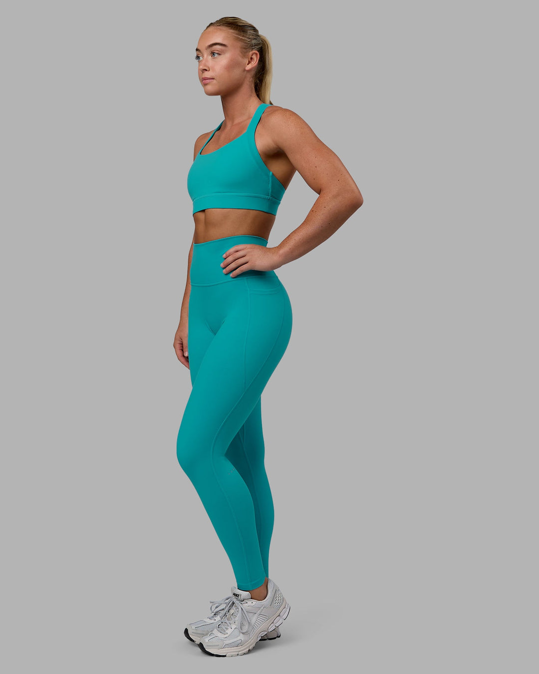 Woman wearing Advance Sports Bra - Uplift Blue