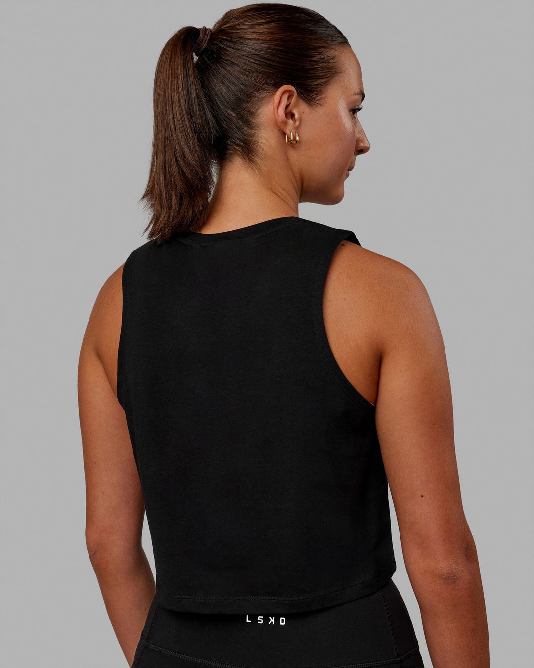 Woman wearing Agile FLXCotton Tank - Black-Black