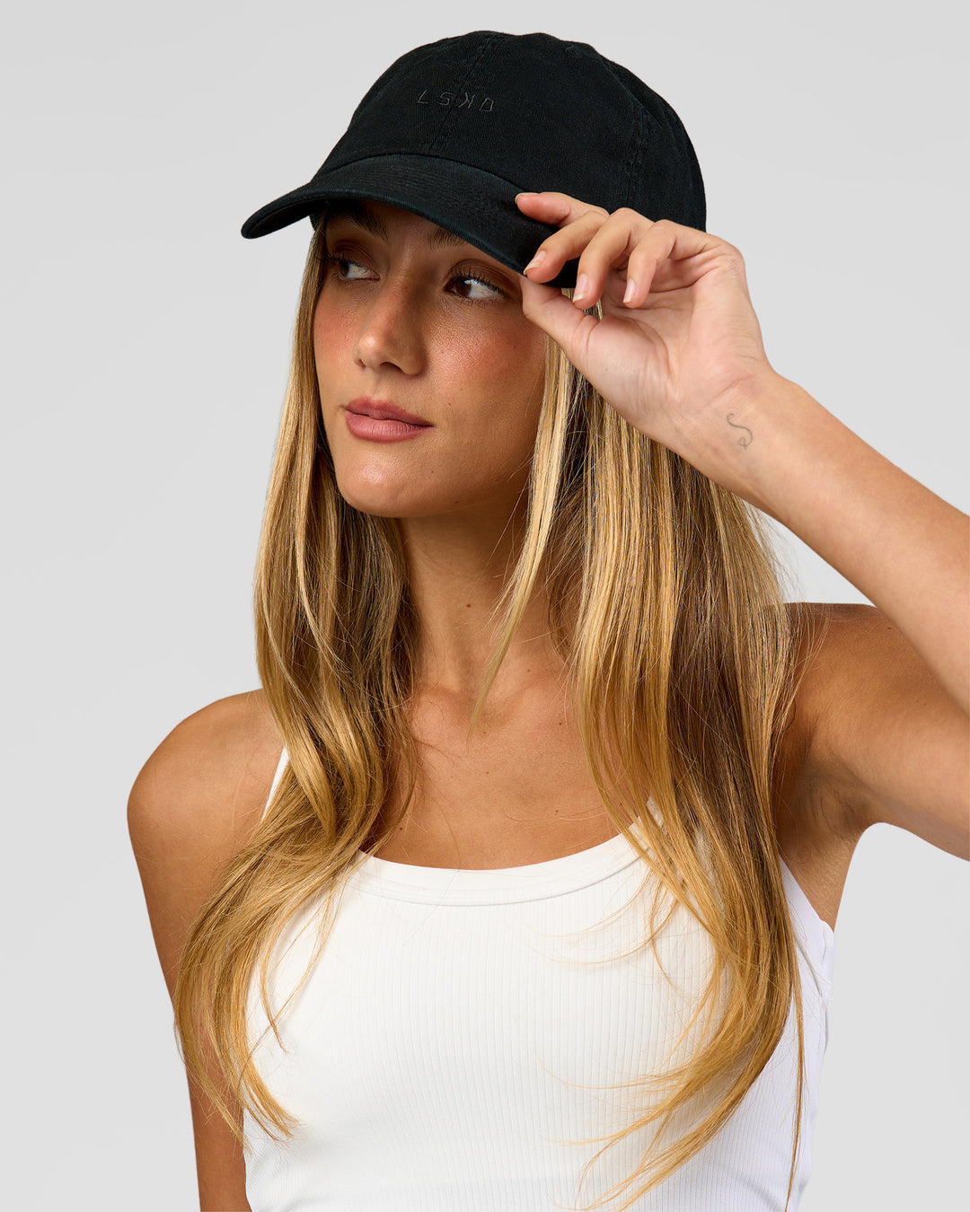 Woman wearing All Day Cap in Black