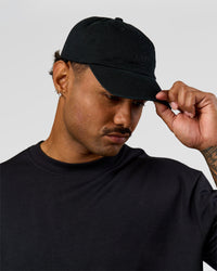 Man wearing All Day Cap in Black