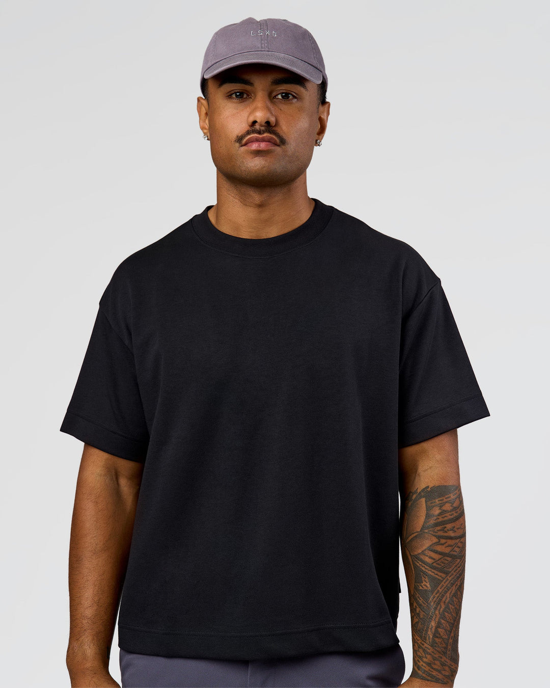 Man wearing All Day Cap in Duskstone