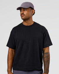 Man wearing All Day Cap in Duskstone