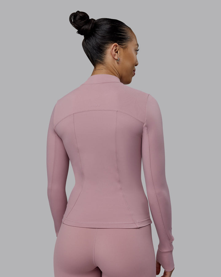 Woman wearing Aspire Jacket - Cosmetic Pink
