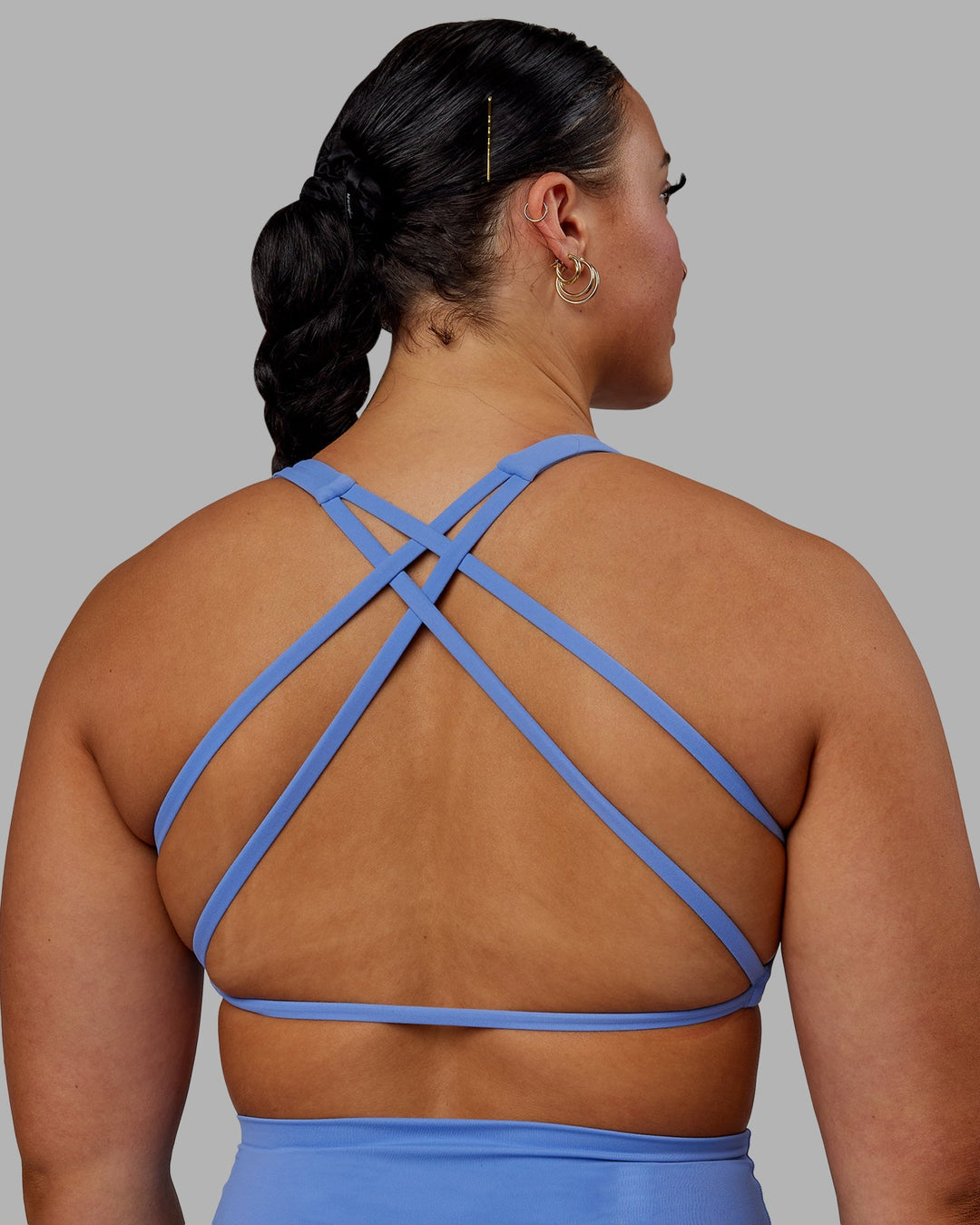 Woman wearing Aspire Sports Bra - Ultramarine