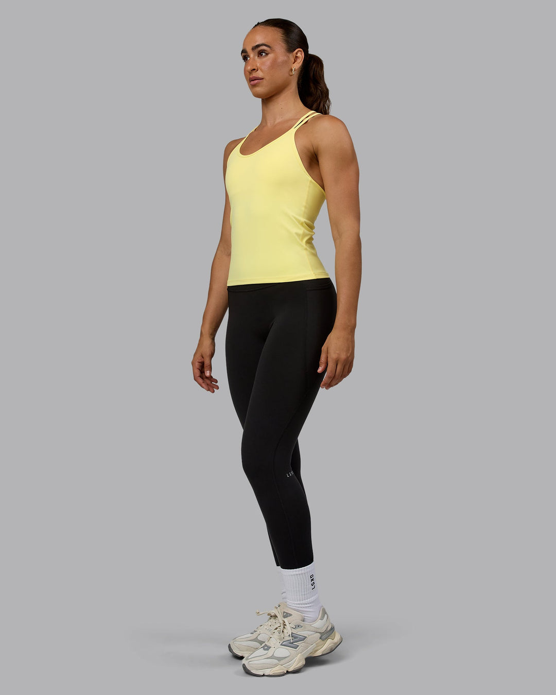 Woman wearing Balance Active Shelf Bra Tank - Lemon