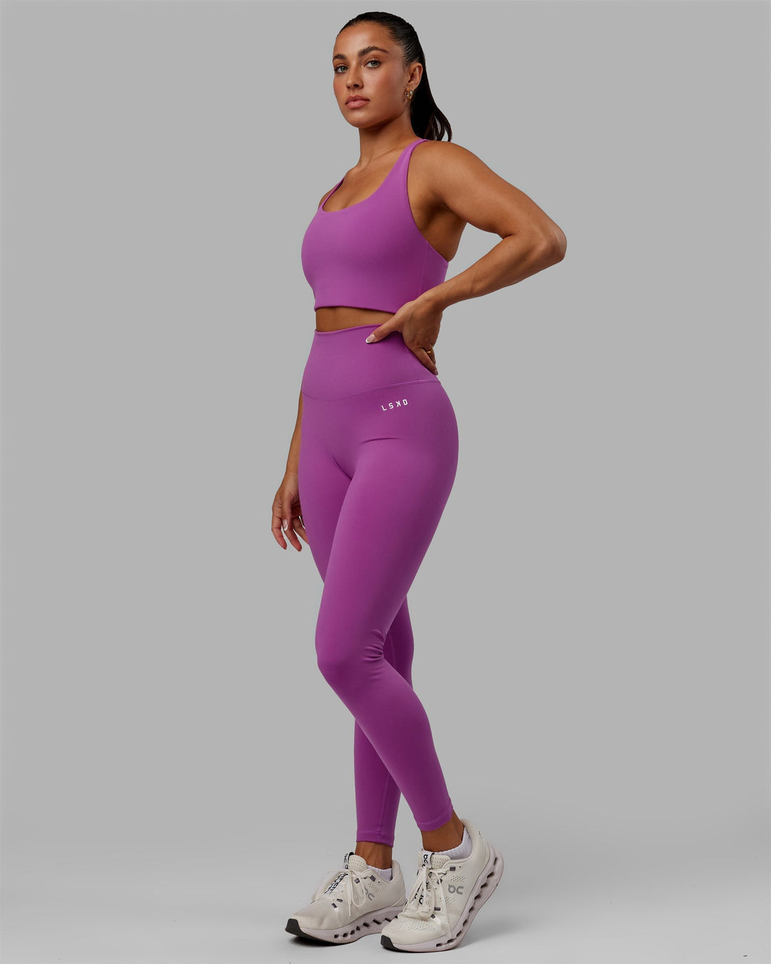 Woman wearing Base 2.0 Full Length Leggings - Hyper Violet