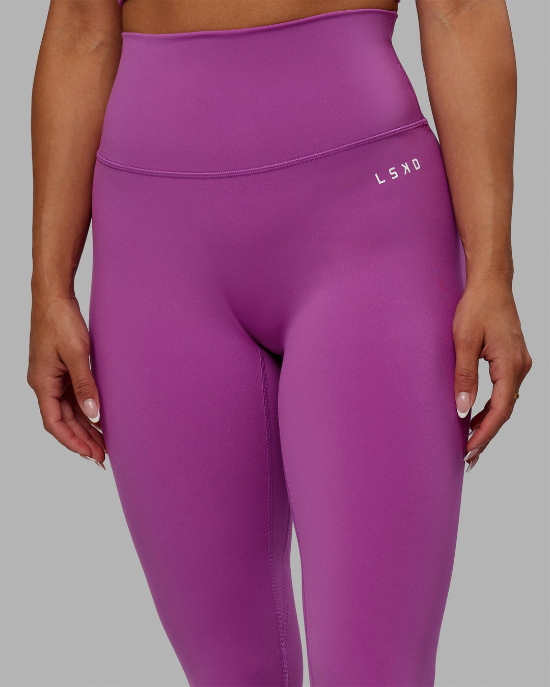 Woman wearing Base 2.0 Full Length Leggings - Hyper Violet