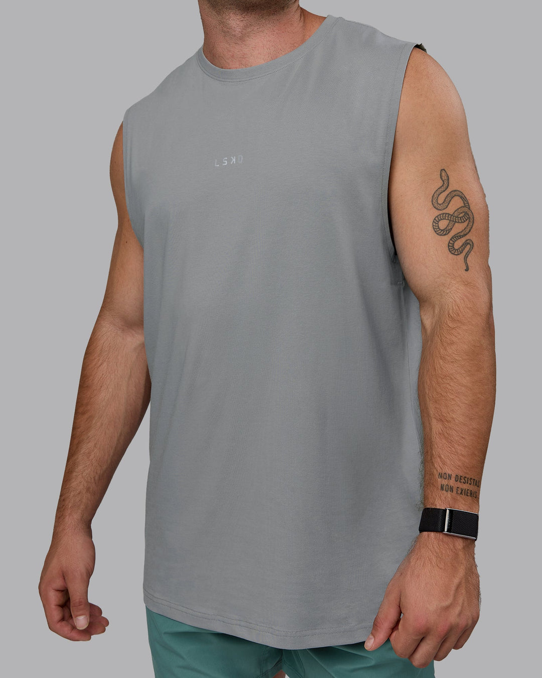 Man wearing Base FLXCotton Tank - Circular Grey