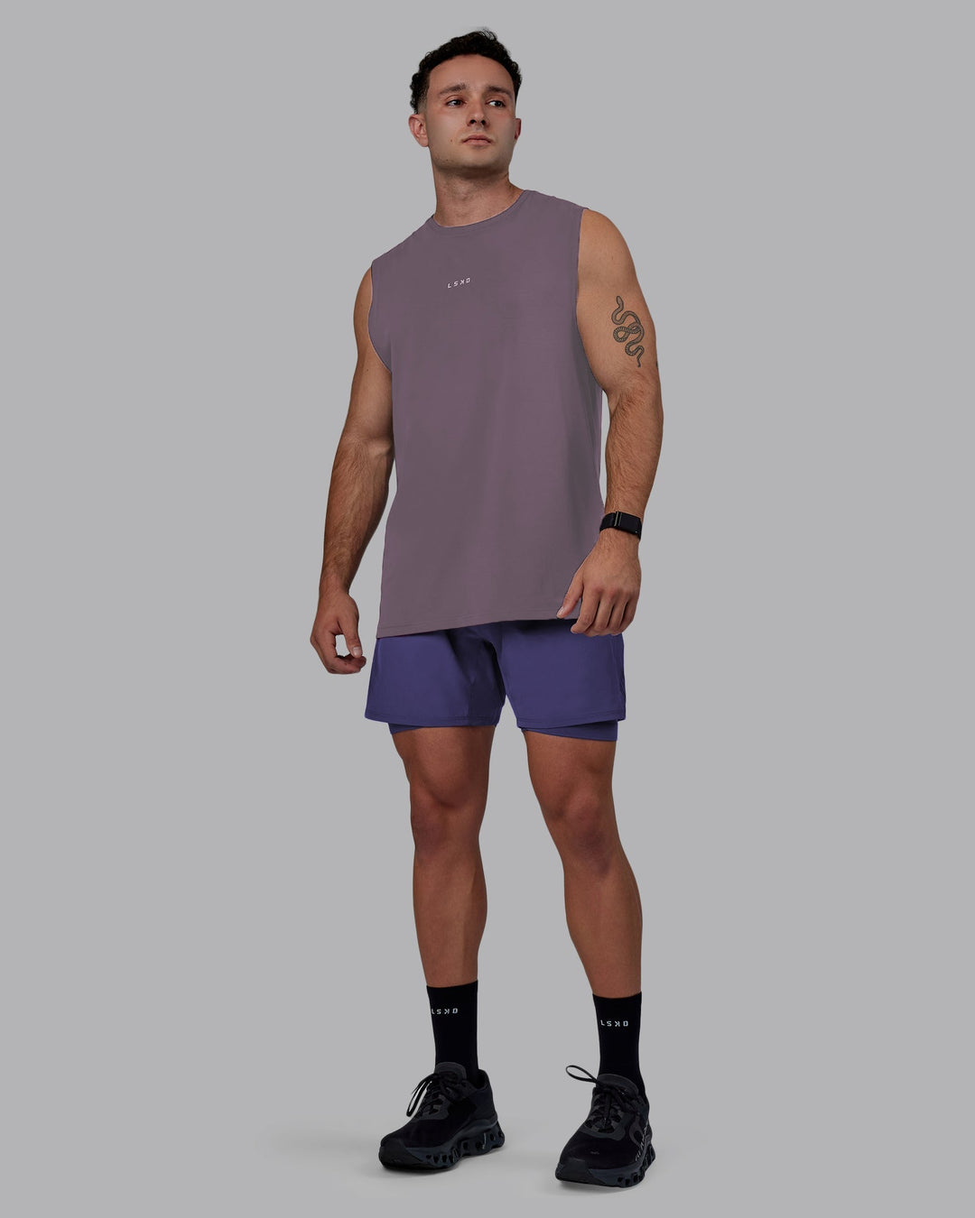 Man wearing Base FLXCotton Tank - Purple Sage