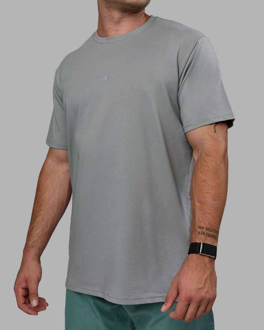 Man wearing Base FLXCotton Tee - Circular Grey