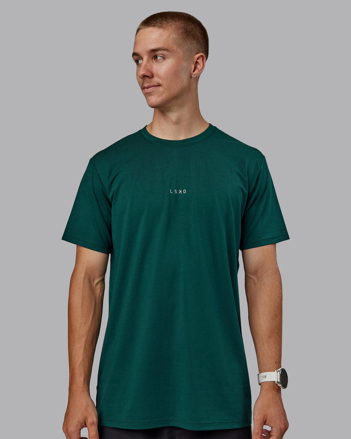 Man wearing Base FLXCotton Tee - Dark Moss
