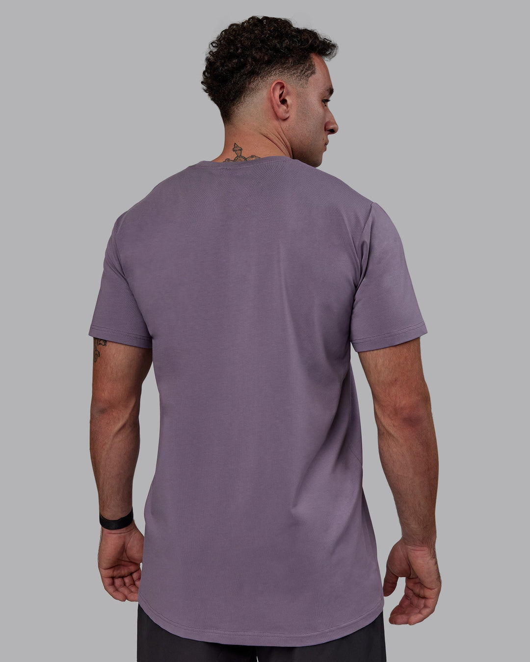 Man wearing Base FLXCotton Tee - Purple Sage