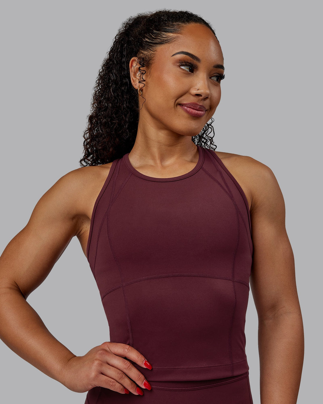 Woman wearing Bend Performance Tank - Dark Cherry