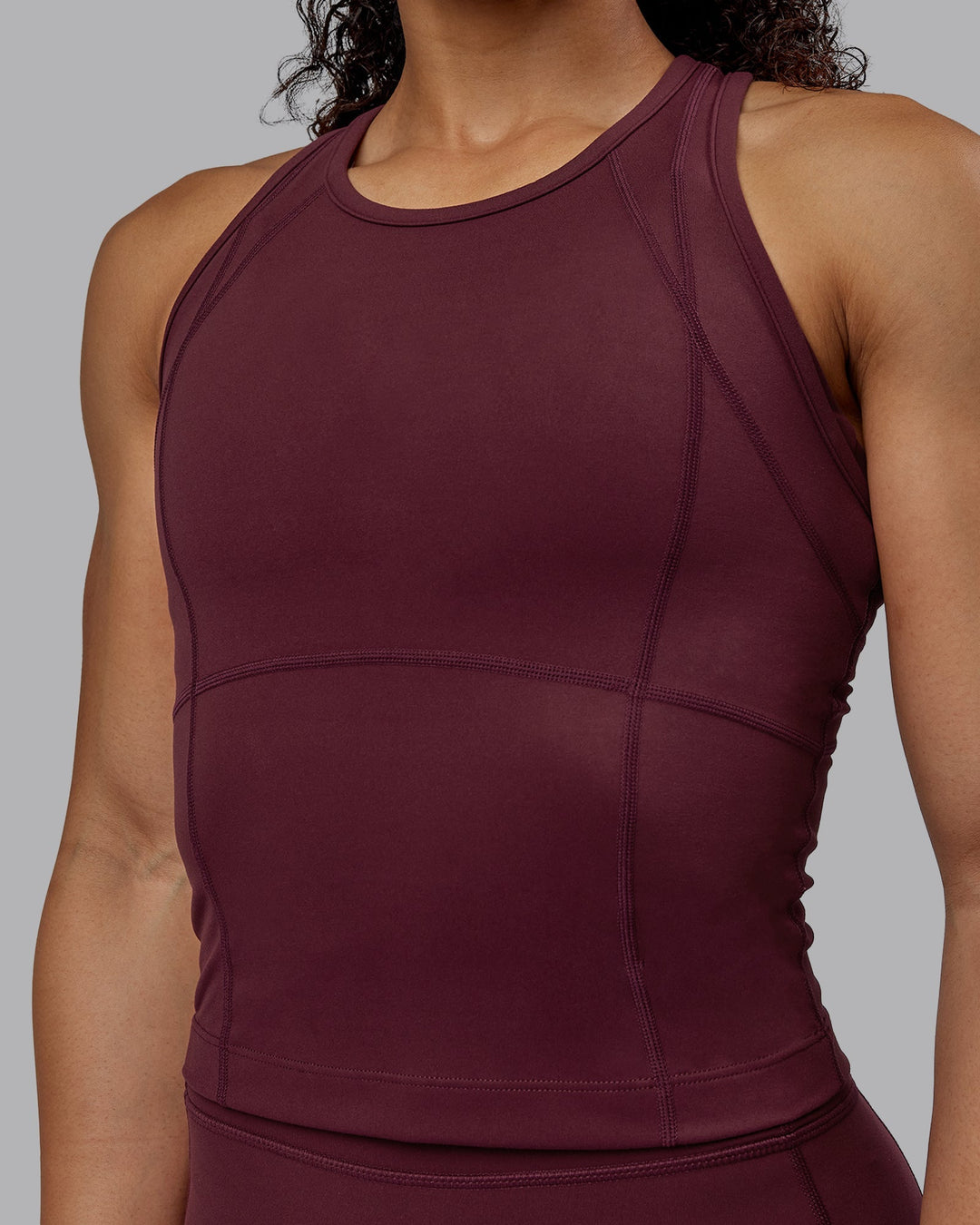 Woman wearing Bend Performance Tank - Dark Cherry