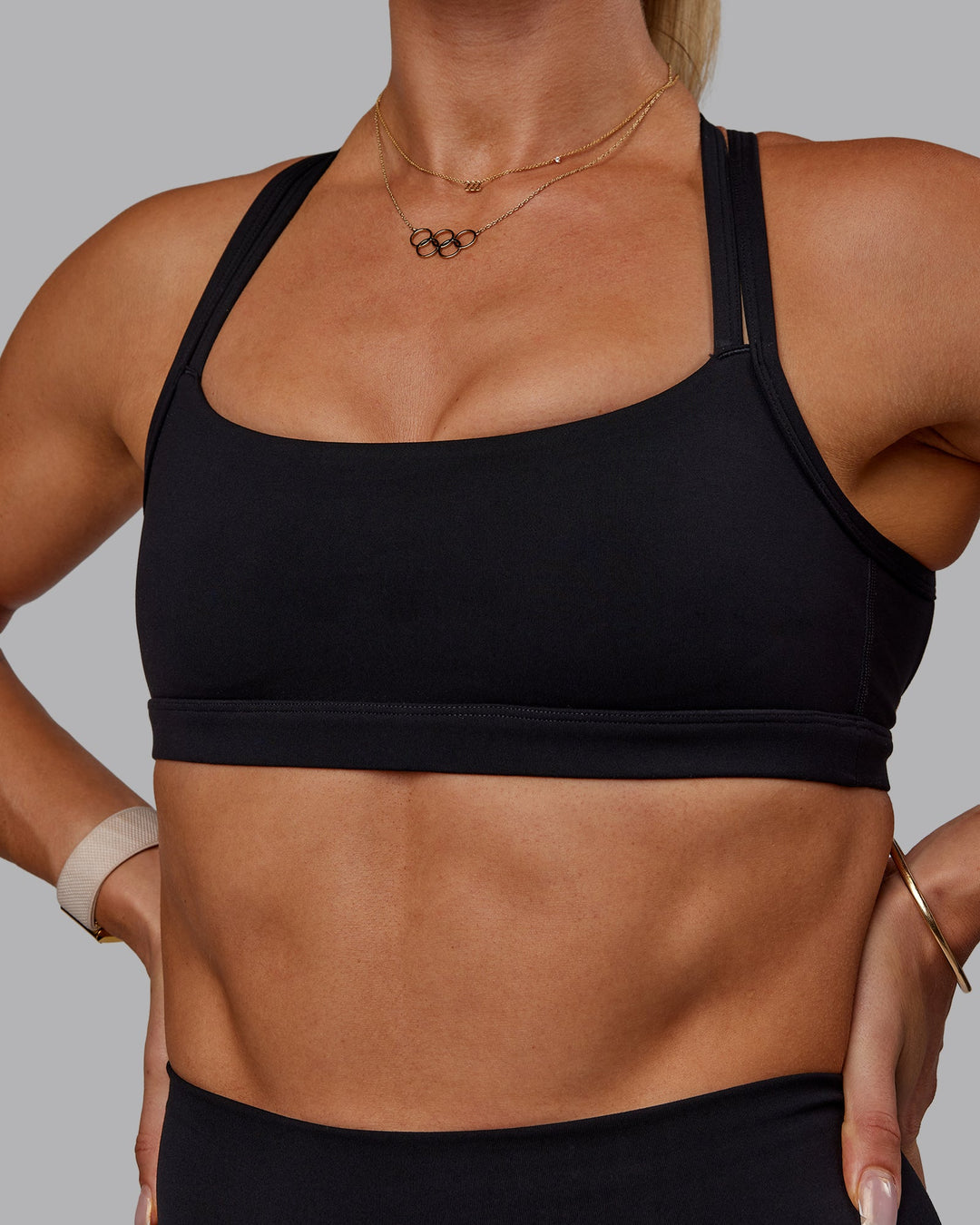 Woman wearing Bree Masters Velocity Sports Bra - Black