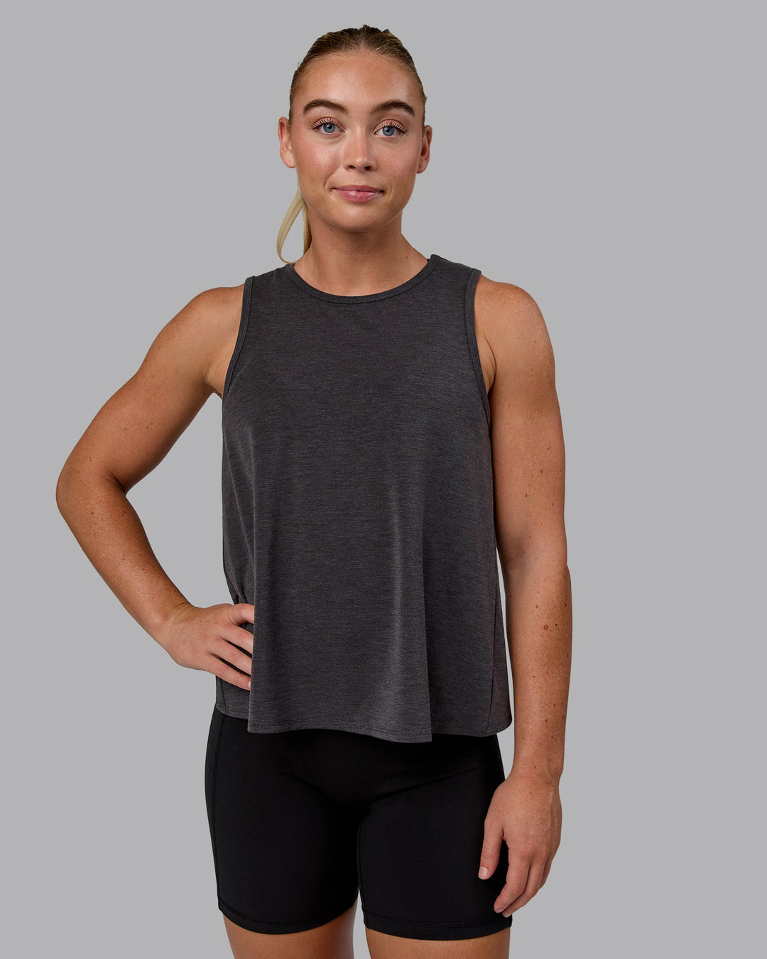 Woman wearing Breeze Training Tank - Black