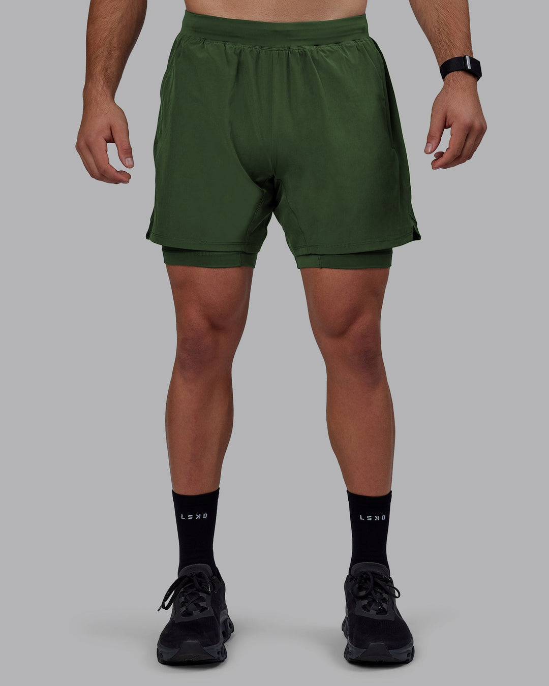 Man wearing Challenger 6&quot; Lined Performance Shorts - Cilantro