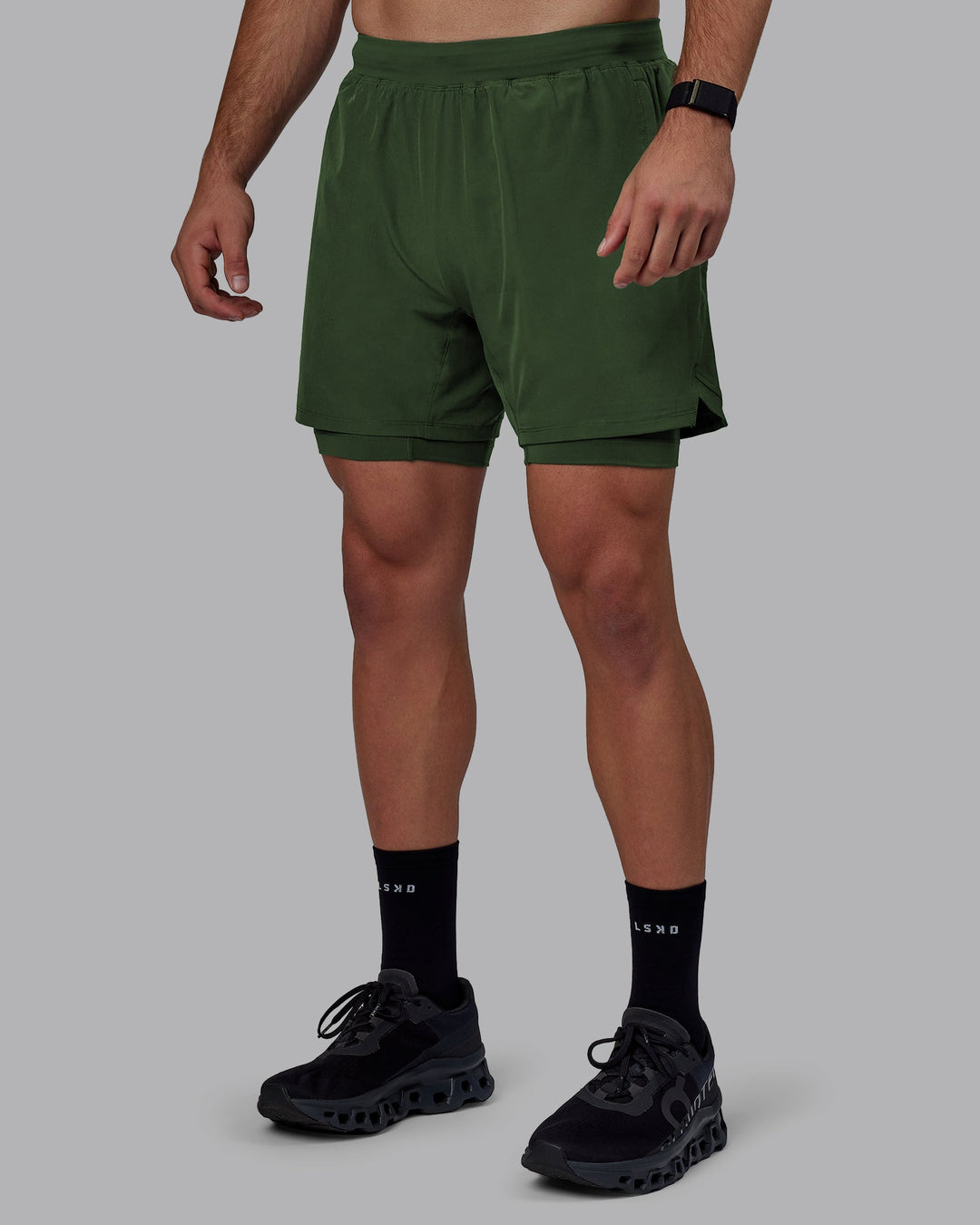 Man wearing Challenger 6&quot; Lined Performance Shorts - Cilantro