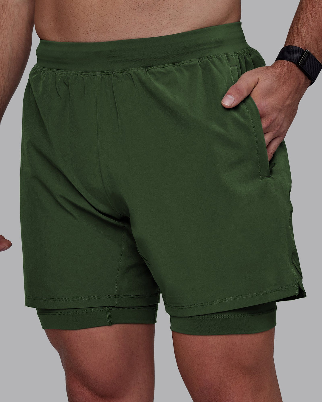 Man wearing Challenger 6&quot; Lined Performance Shorts - Cilantro