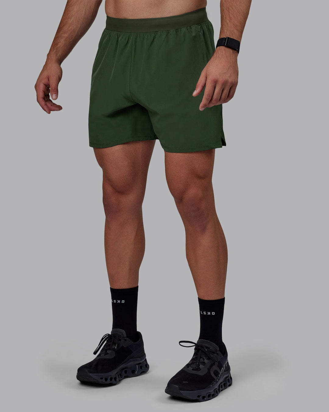 Man wearing Challenger 6&quot; Performance Shorts - Cilantro