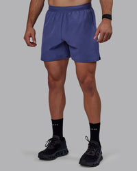 Man wearing Challenger 6" Performance Shorts - Future Dusk