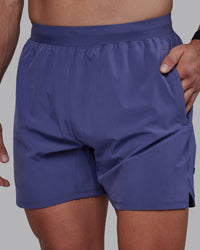 Man wearing Challenger 6" Performance Shorts - Future Dusk